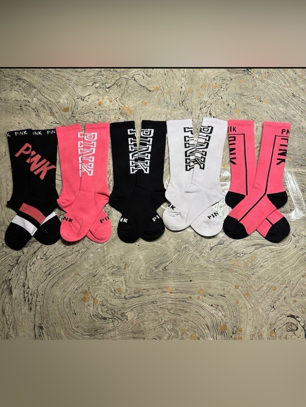 Pink Victoria’s Secret Socks
New Pink socks 
5 pairs
Size Large 6-10